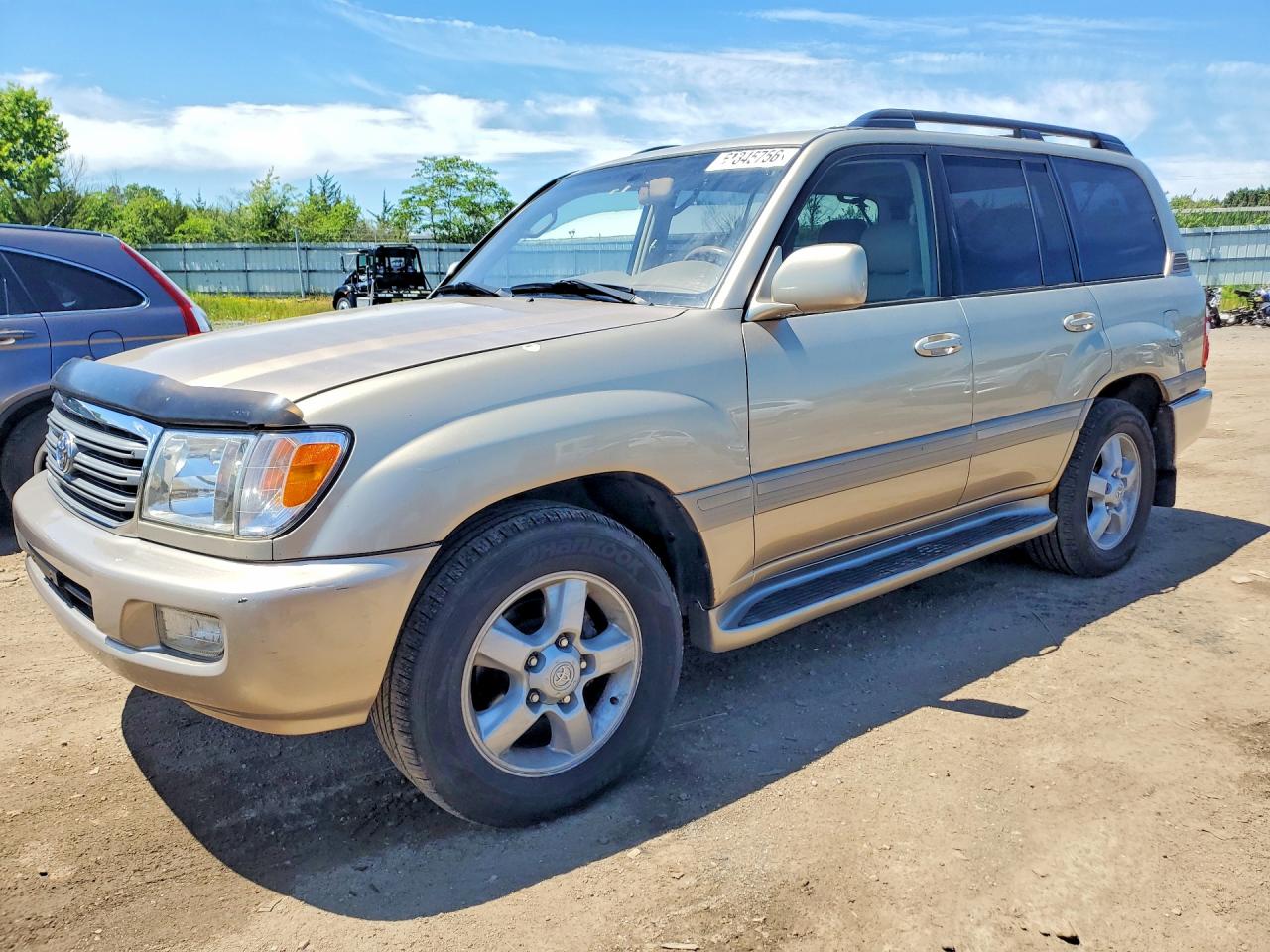 2005 Toyota Land Cruiser Base Gold vin: JTEHT05J152070853