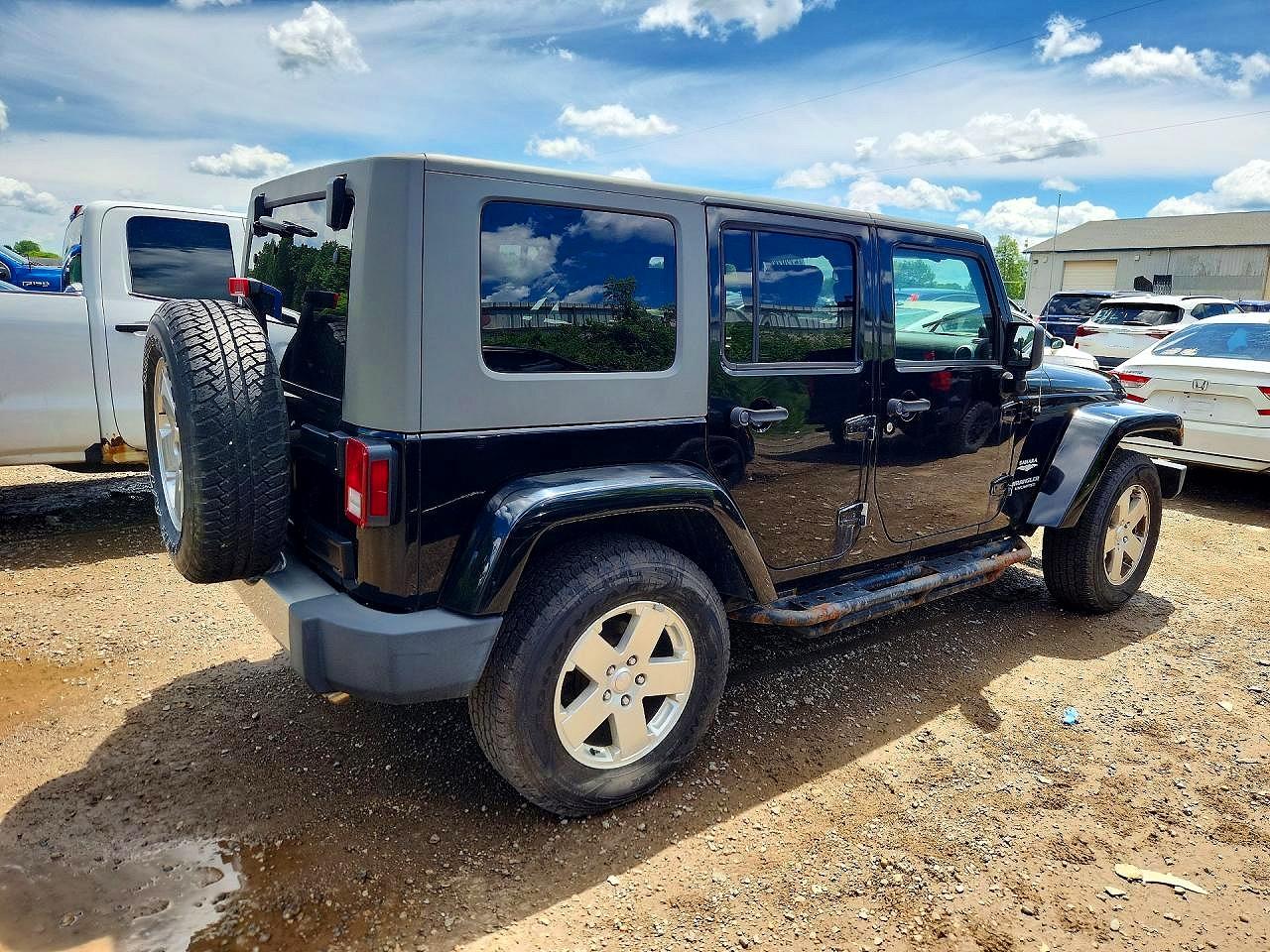 2010 Jeep Wrangler Unlimited Sahara Black vin: 1J4BA5H18AL205639