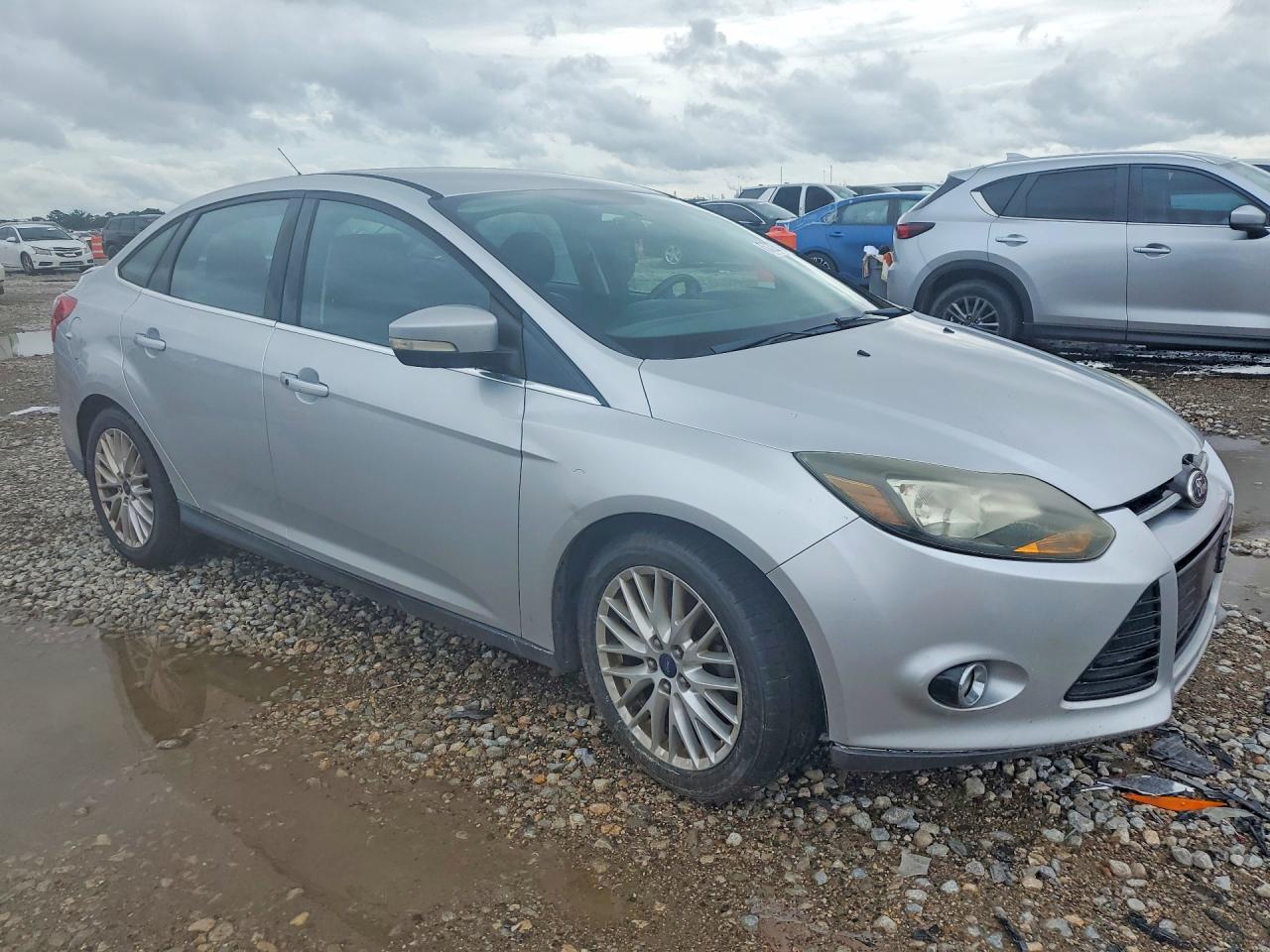 2013 Ford Focus Titanium Серебряный vin: 1FADP3J20DL345814