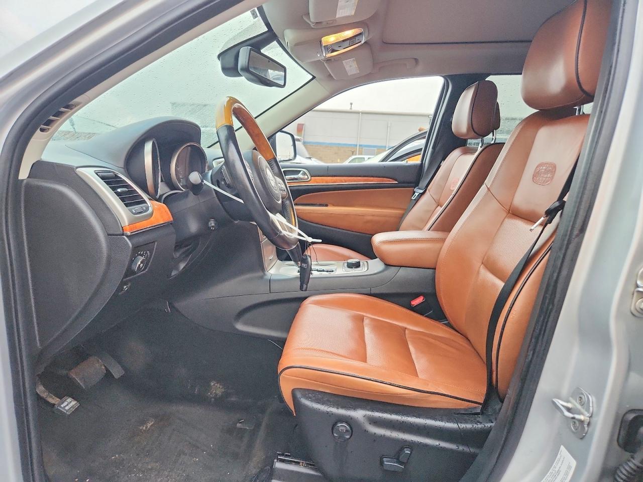 2012 Jeep Grand Cherokee Overland Silver vin: 1C4RJFCGXCC292257