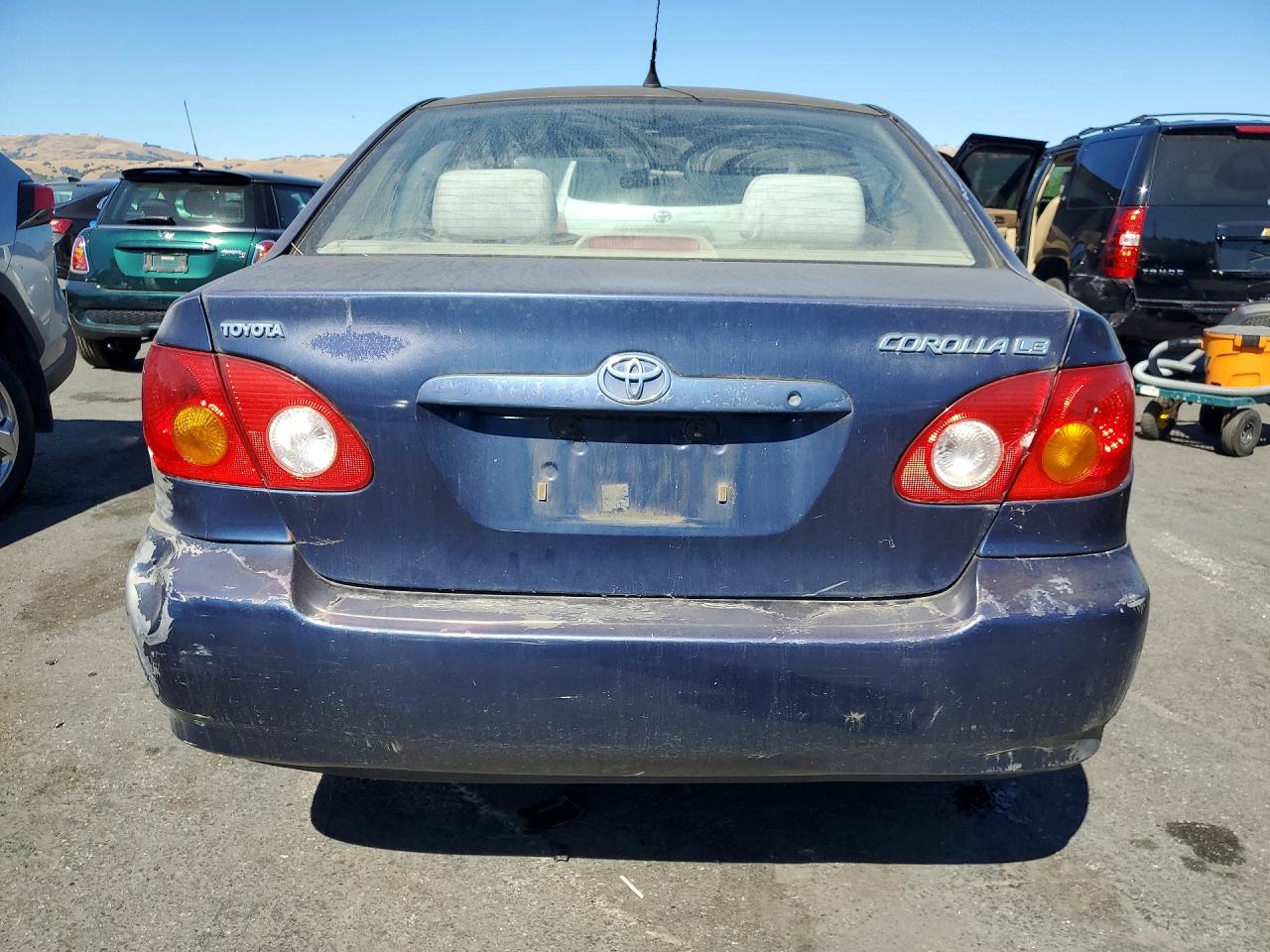 2004 Toyota Corolla Le Blue vin: 1NXBR32E84Z260617