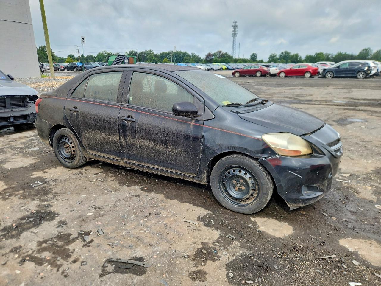 2007 Toyota Yaris Base Black vin: JTDBT923871165388