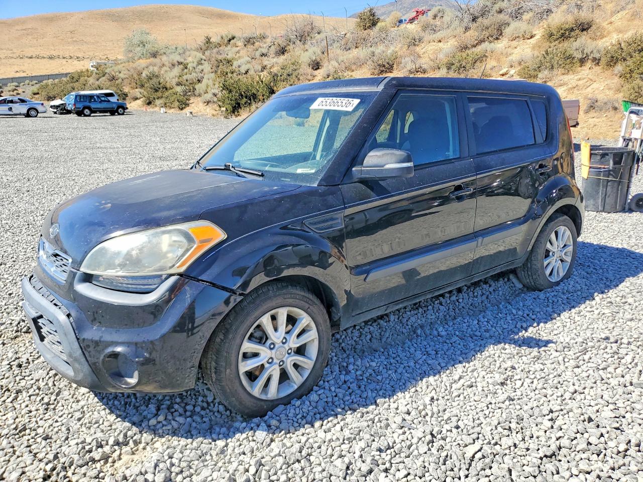2012 Kia Soul + Black vin: KNDJT2A61C7380844
