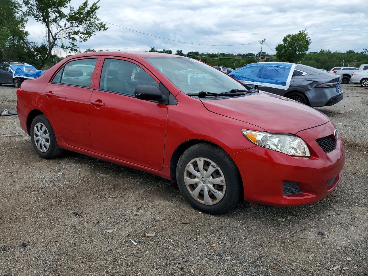 2009 Toyota Corolla Le Red vin: 2T1BU40E19C105715