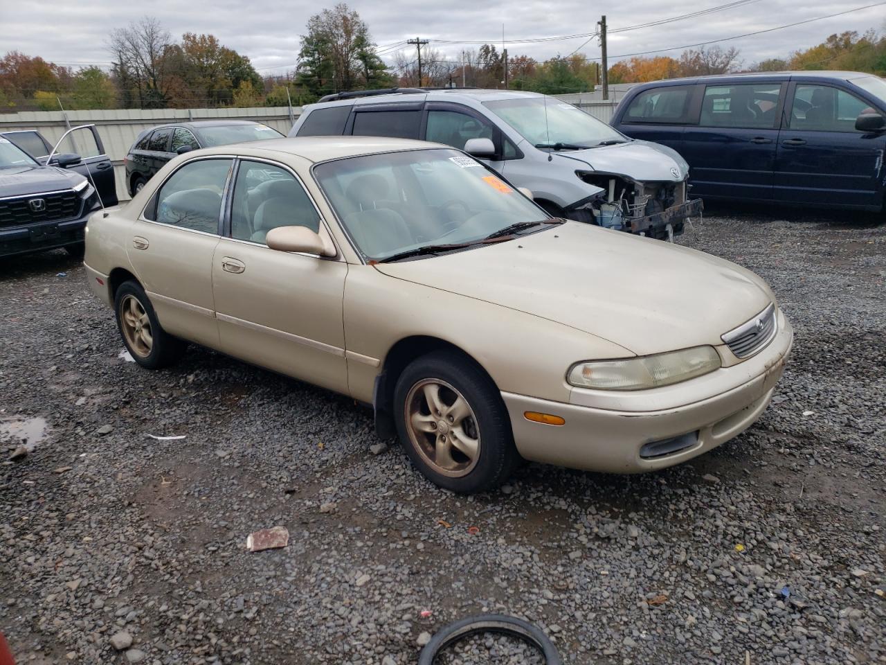 1996 Mazda 626 Es Gold vin: 1YVGE22D0T5580265