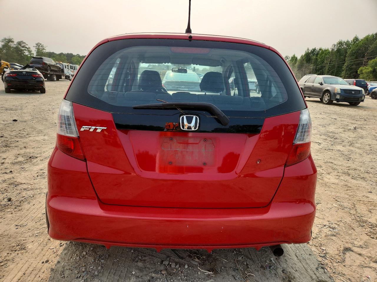 2009 Honda Fit Красный vin: JHMGE88289C000276