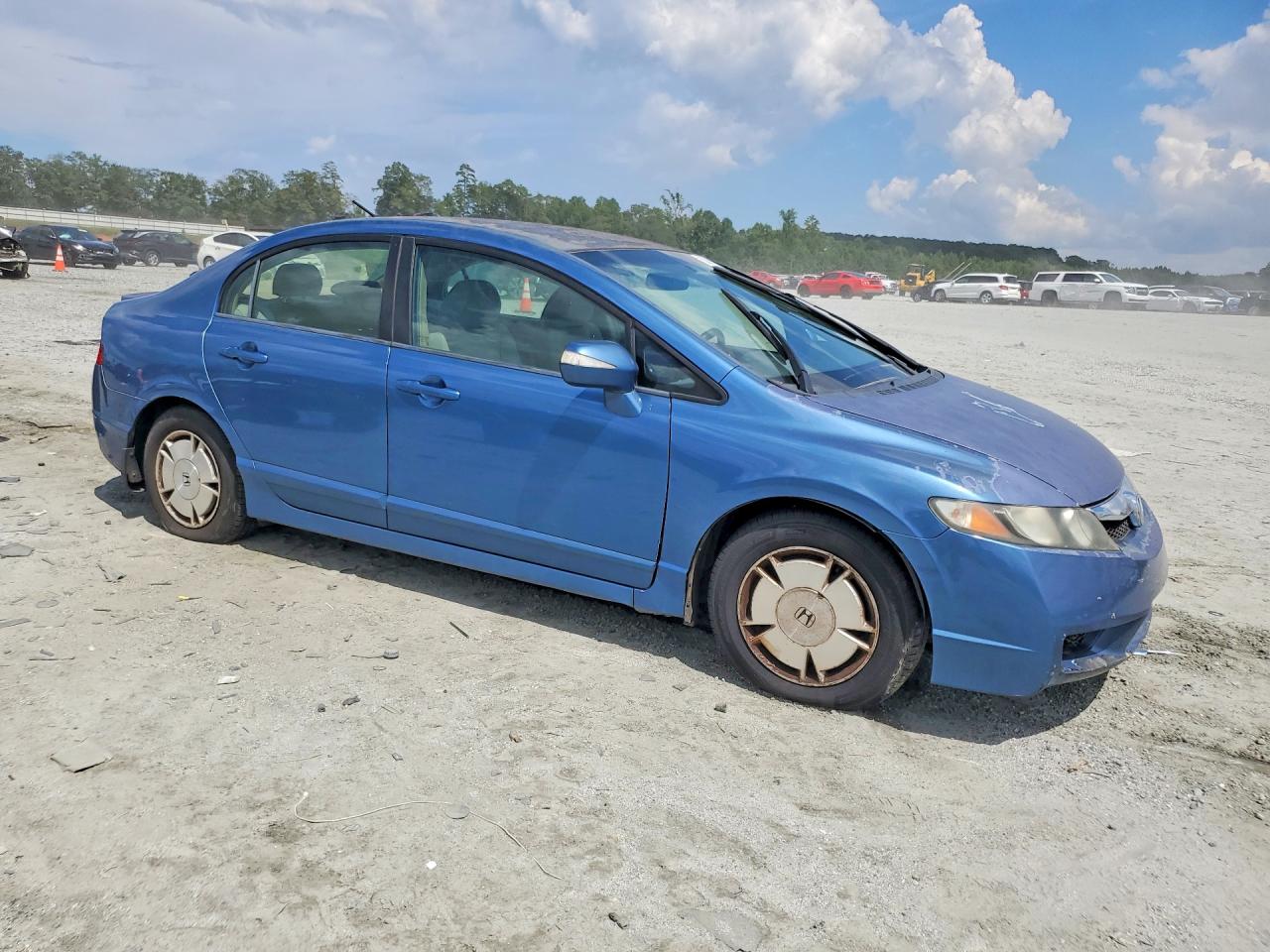 2010 Honda Civic Hybrid Blue vin: JHMFA3F27AS001555