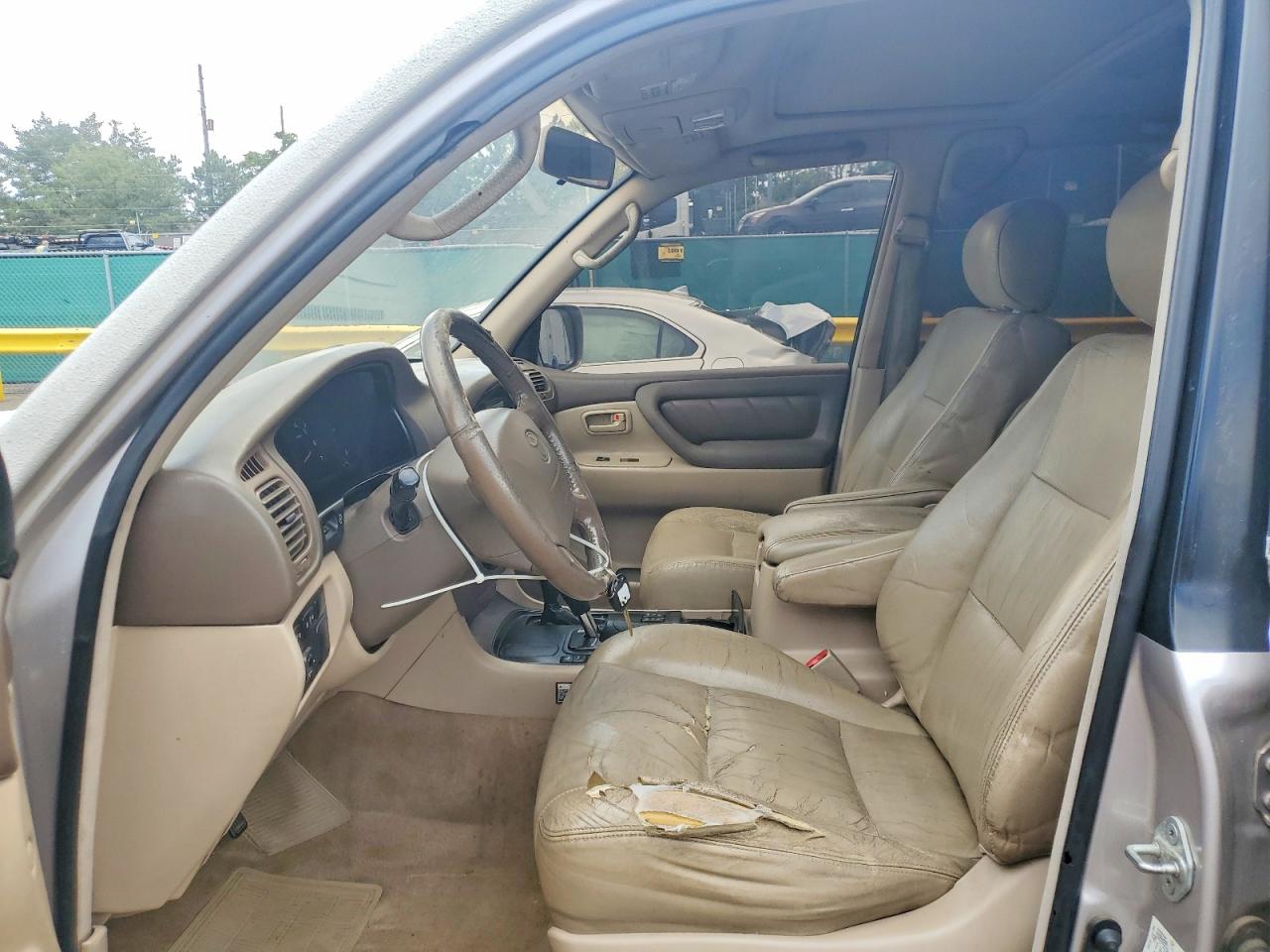 2000 Toyota Land Cruiser Base Beige vin: JT3HT05J2Y0096774
