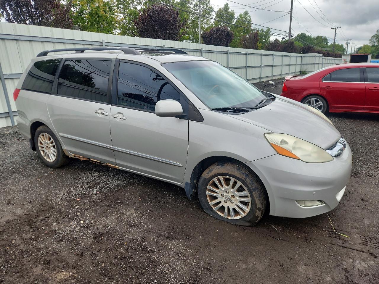 2009 Toyota Sienna Limited Beige vin: 5TDBK22C49S026293