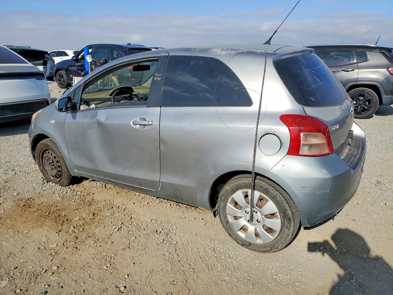 2008 Toyota Yaris Base Серый vin: JTDJT923185209835