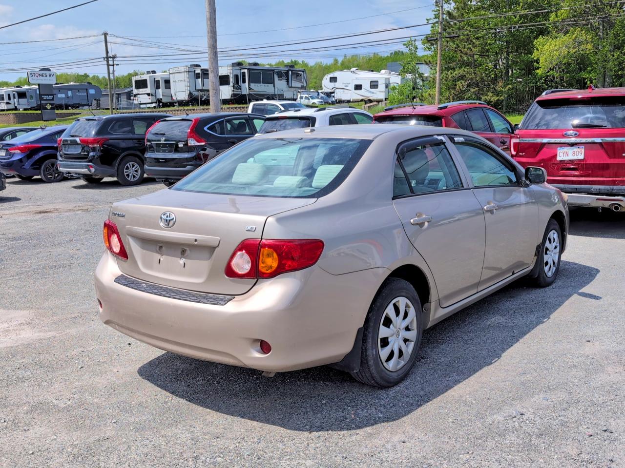 2010 Toyota Corolla Base Gold vin: 2T1BU4EE5AC210075