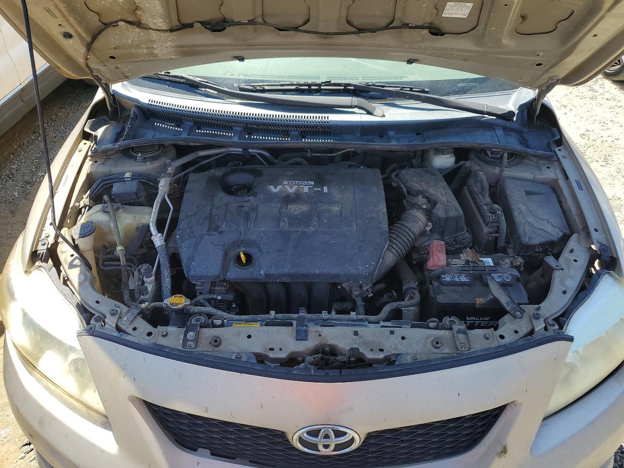 2010 Toyota Corolla Le Gold vin: 2T1BU4EE8AC354896