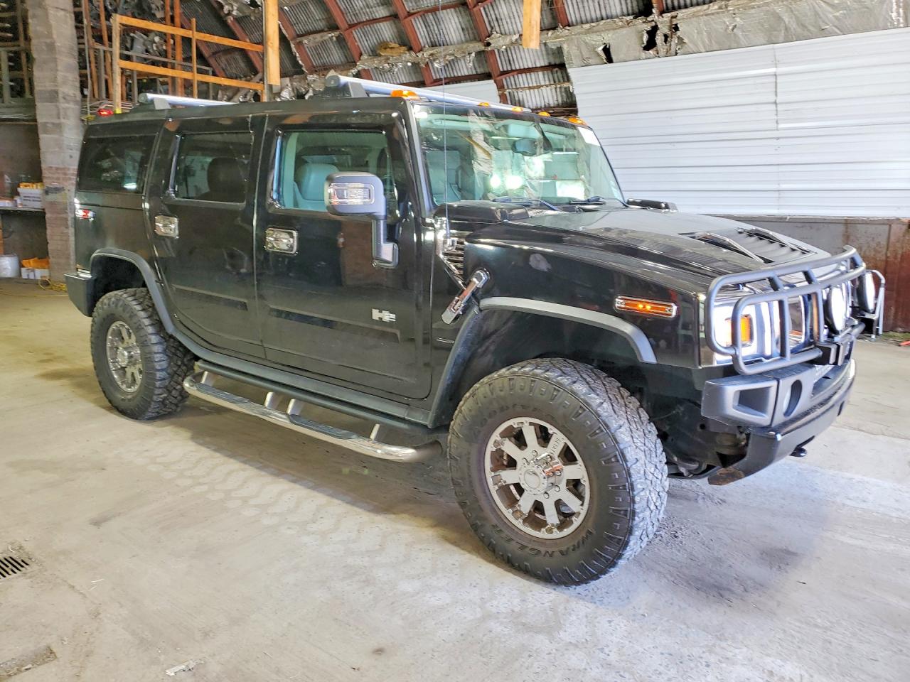 2004 Hummer H2 Black vin: 5GRGN23U74H107367