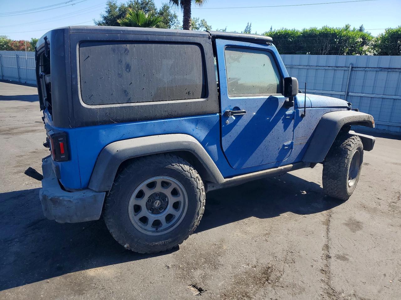 2015 Jeep Wrangler Sport Blue vin: 1C4AJWAG8FL510474