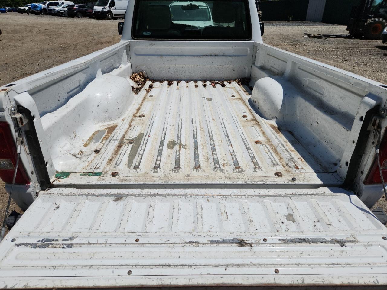 2010 Ford Ranger White vin: 1FTKR1AD8APA09799 Damage: Inside Bed, Rust, > 12 Inches