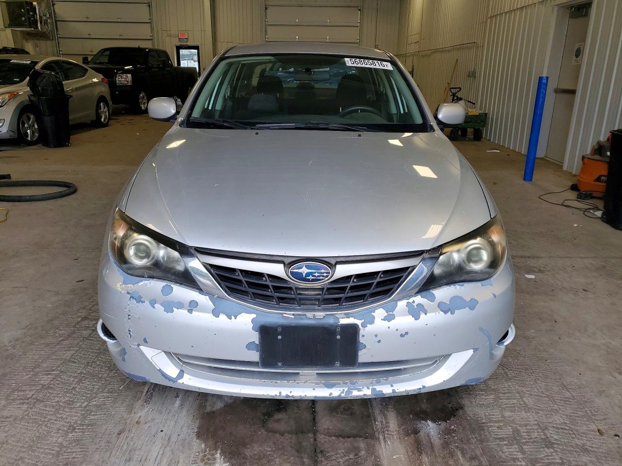 2009 Subaru Impreza 2.5i Silver vin: JF1GE61639H506027