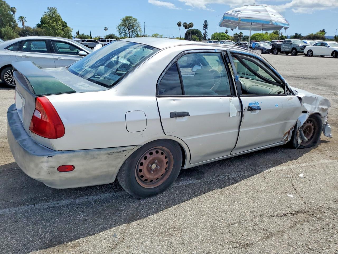 2001 Mitsubishi Mirage Es Silver vin: JA3AY26C51U042215