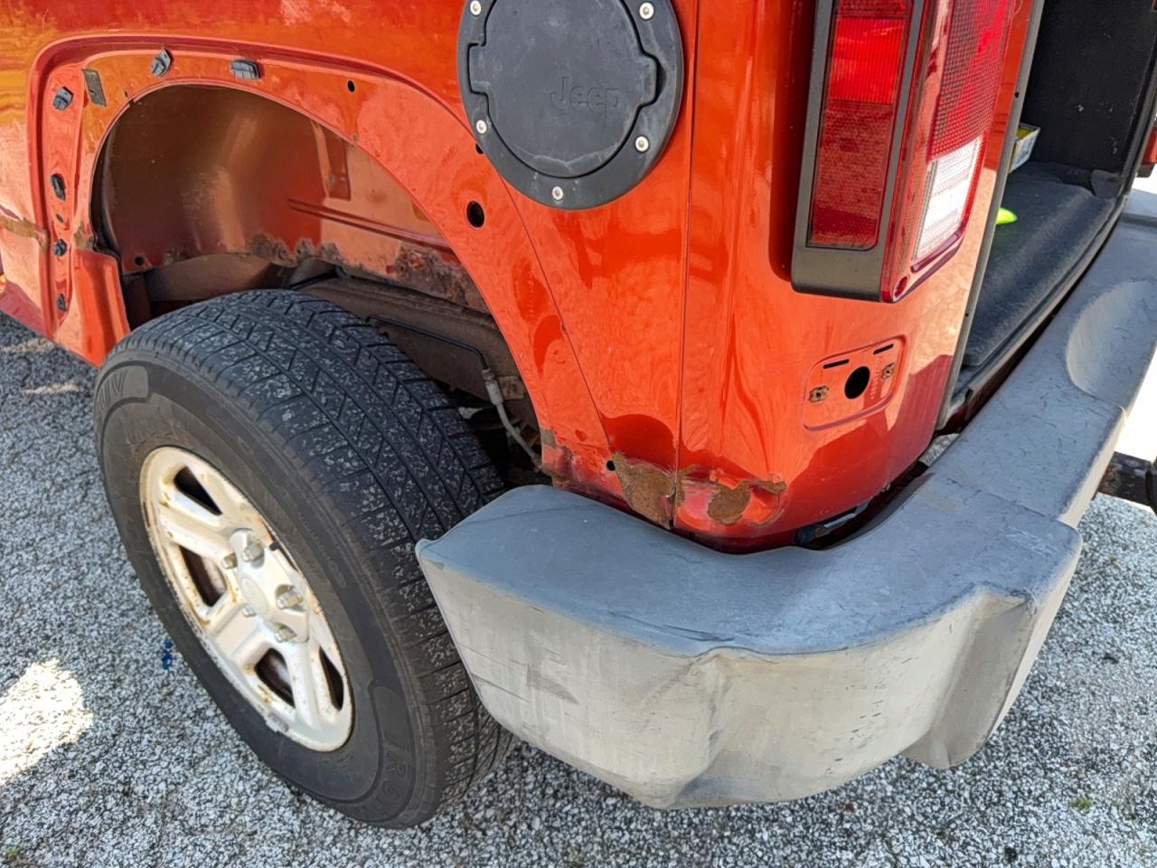 2009 Jeep Wrangler X Orange vin: 1J4FA24149L770116