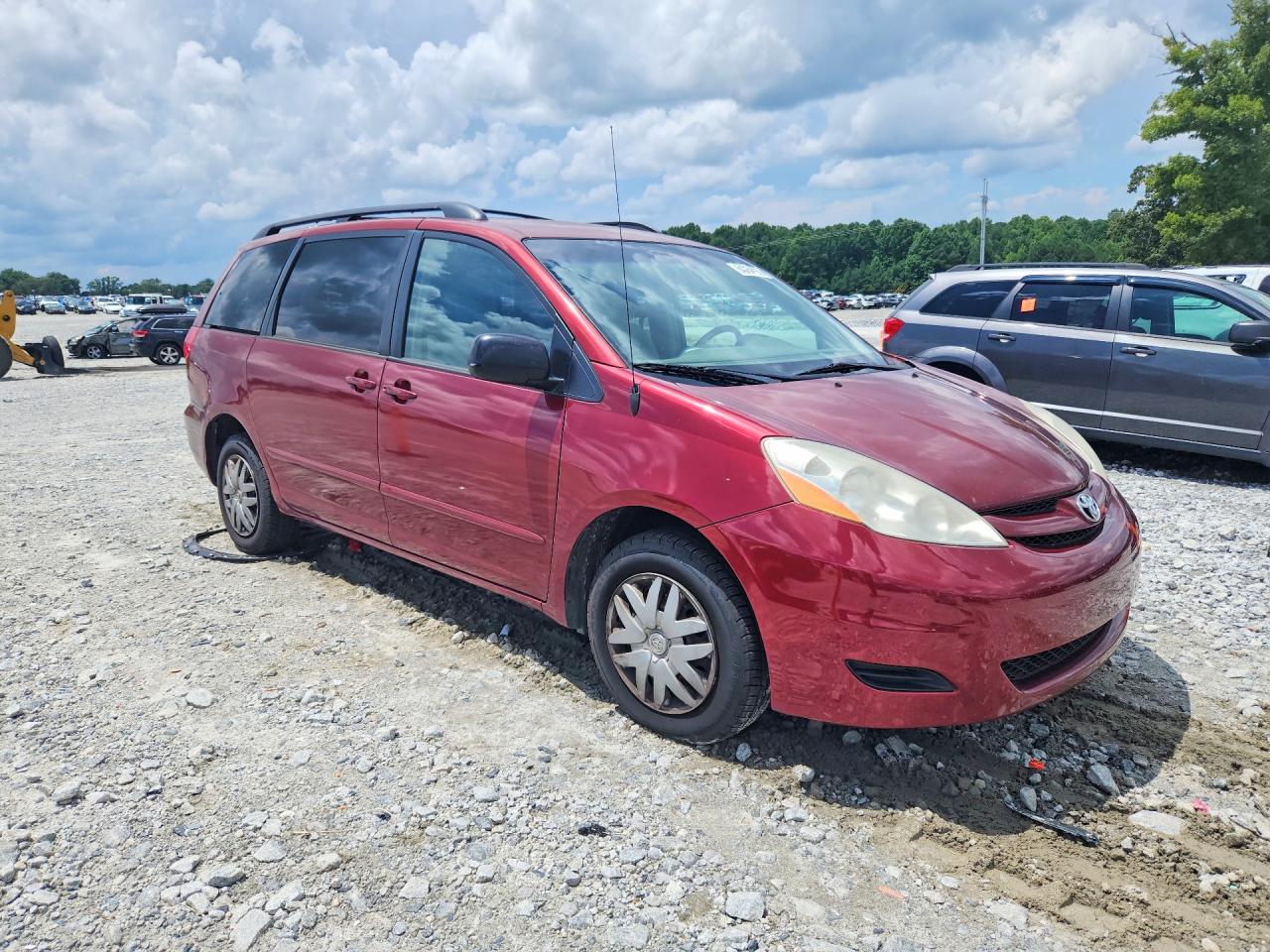 2010 Toyota Sienna Le 7-passenger Burgundy vin: 5TDKK4CC3AS341570
