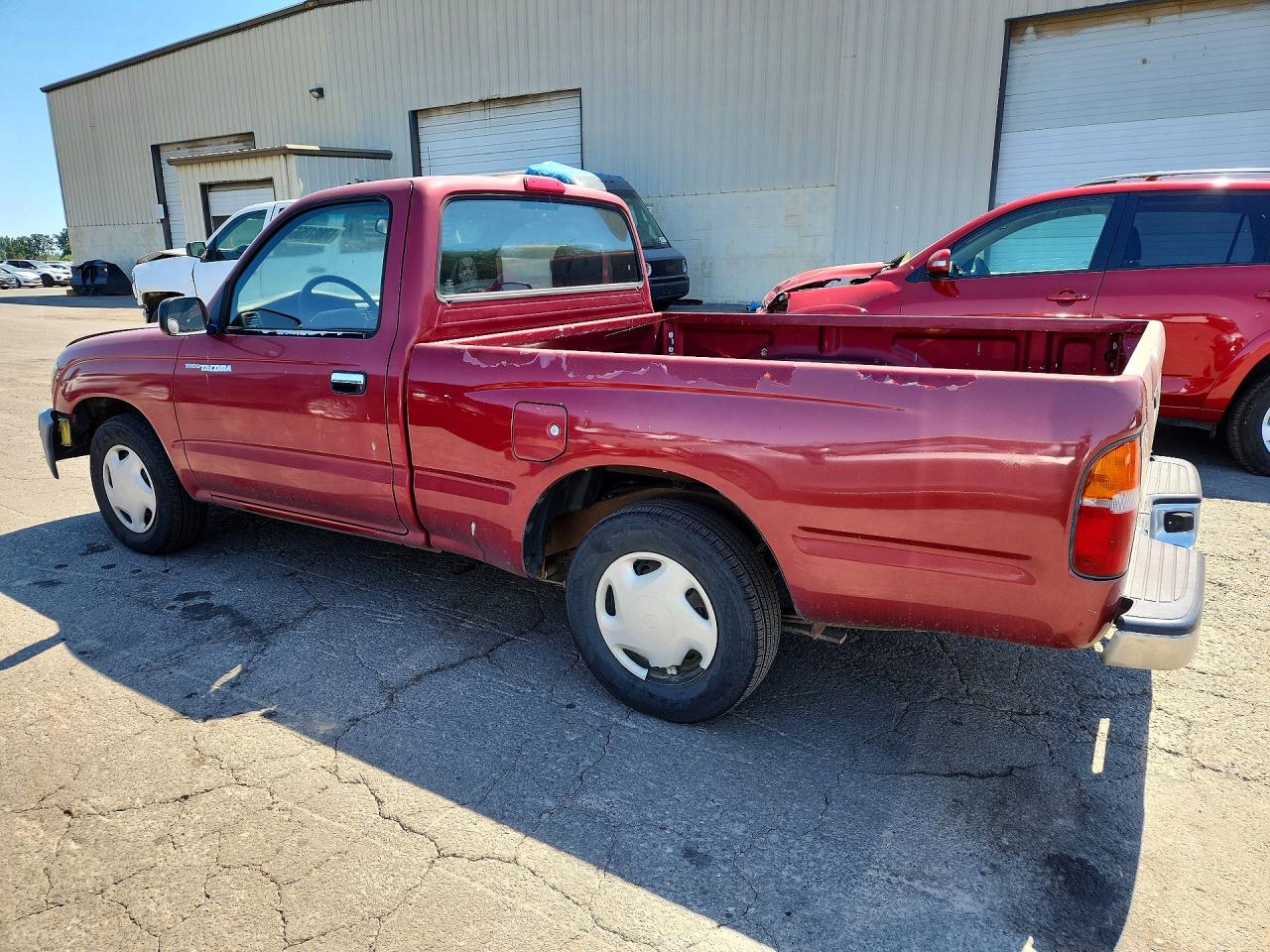 1999 Toyota Tacoma Base Red vin: 4TANL42N5XZ557999