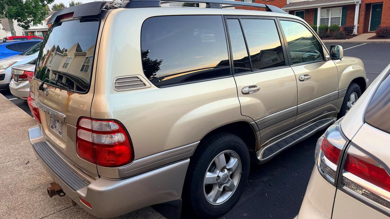 2004 Toyota Land Cruiser Base Gold vin: JTEHT05J742060388