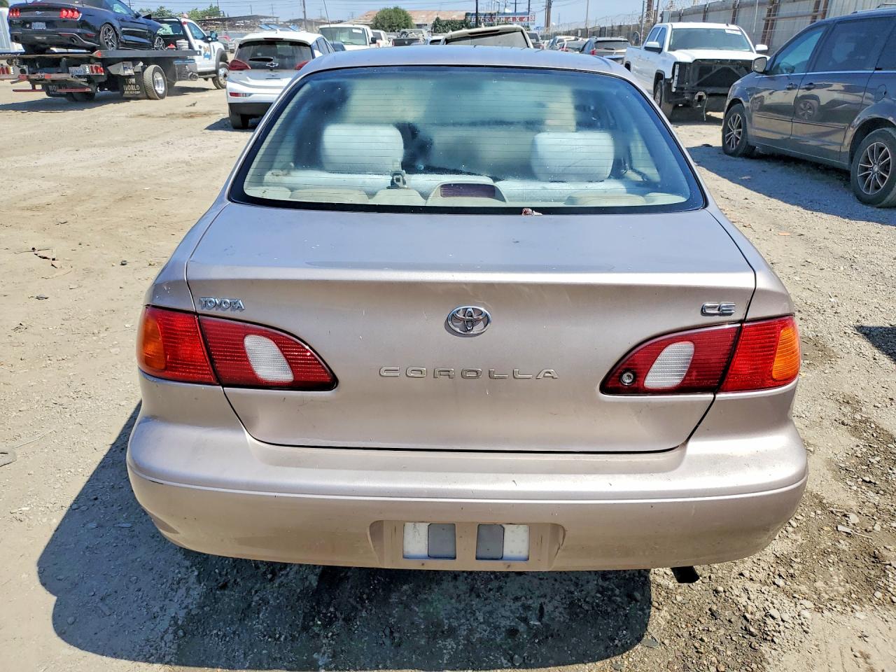 1998 Toyota Corolla Ve Tan vin: 1NXBR12EXWZ117823