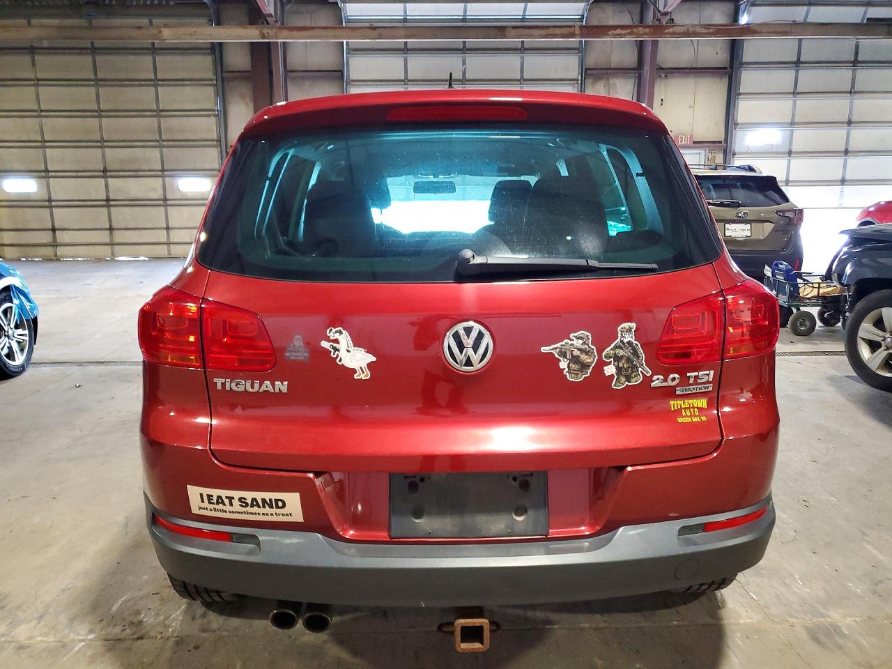 2013 Volkswagen Tiguan S Burgundy vin: WVGBV3AXXDW067145