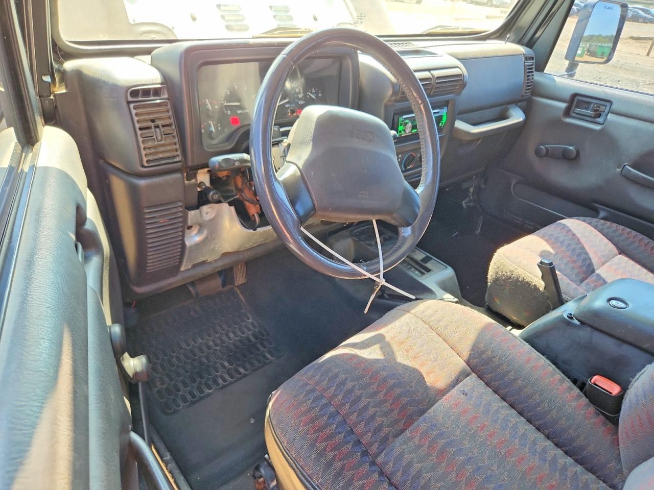 1999 Jeep Wrangler / Tj Sport Black vin: 1J4FY19S0XP458792