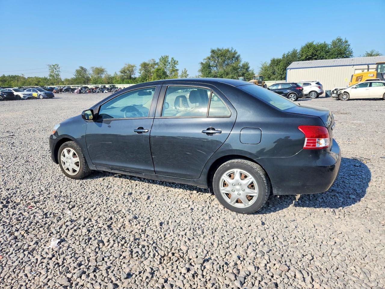 2010 Toyota Yaris Base Black vin: JTDBT4K37A1376091
