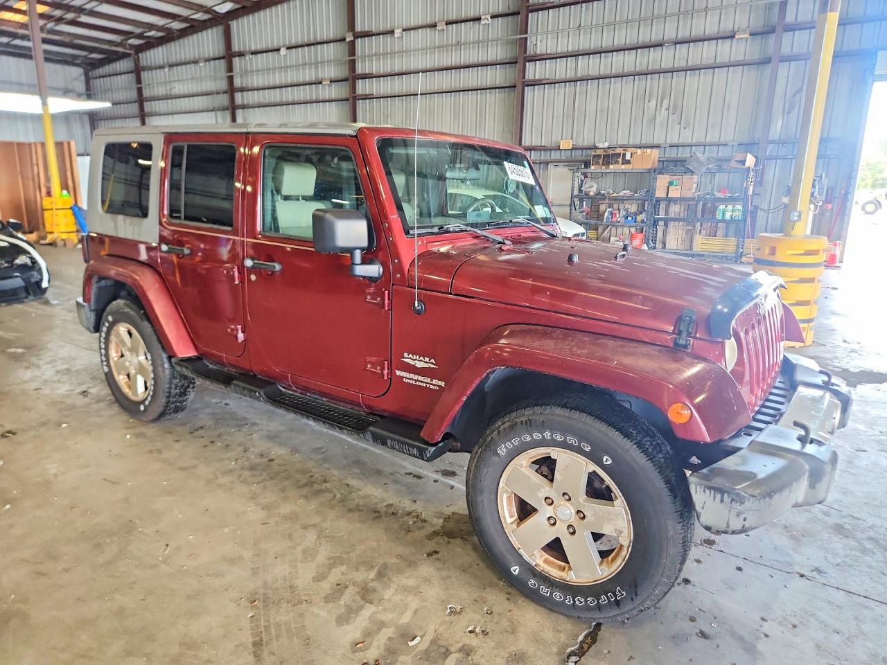 2009 Jeep Wrangler Unlimited Sahara Red vin: 1J4GA59169L750562