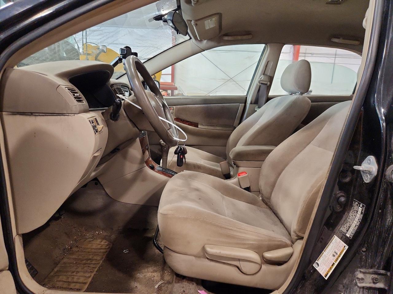 2005 Toyota Corolla Le Black vin: JTDBR32EX50057368