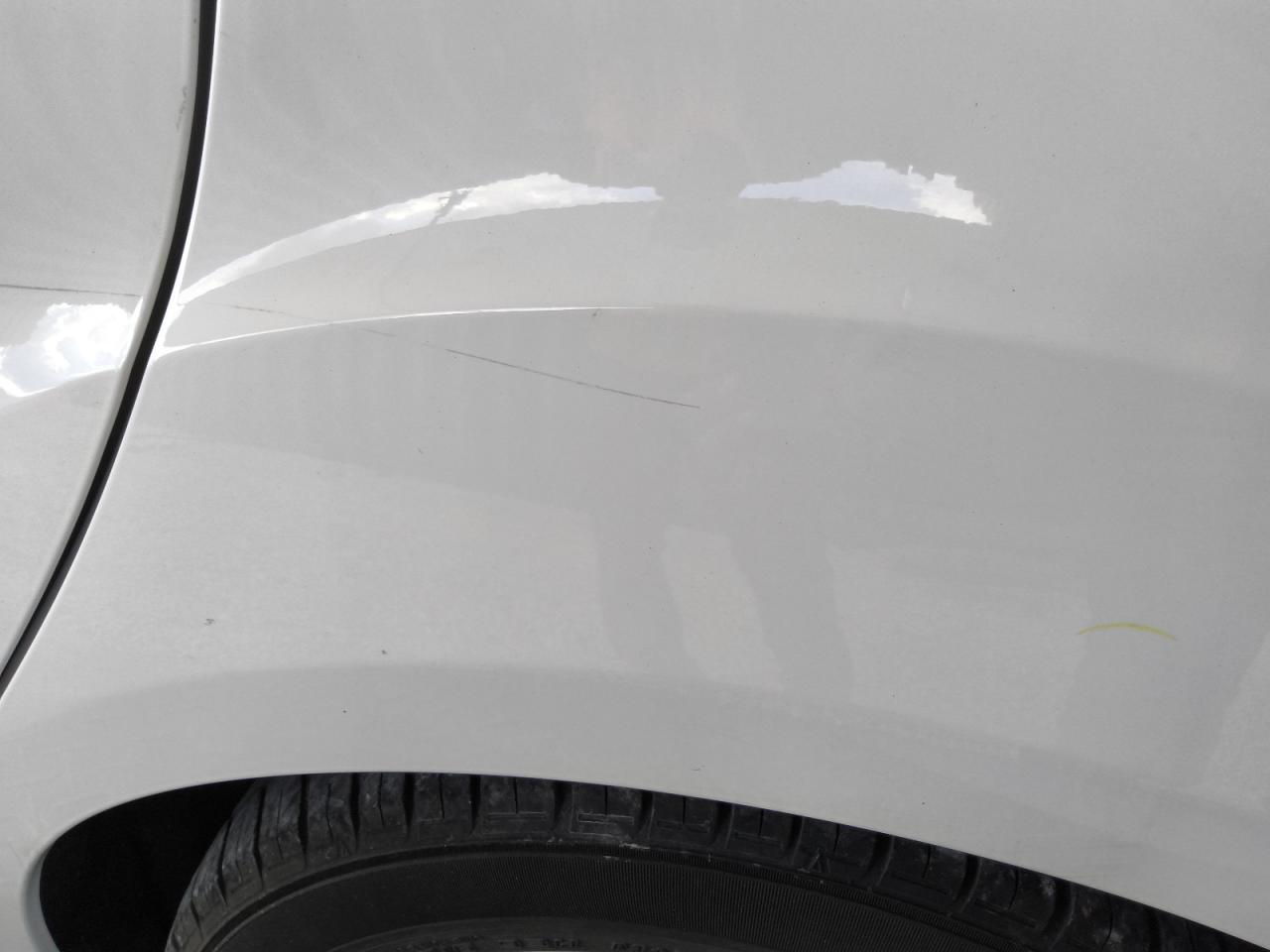 2014 Ford Focus Se White vin: 1FADP3F22EL345890 Damage: Left Qtr Panel, Light Scratch, 5 To 6 Inches