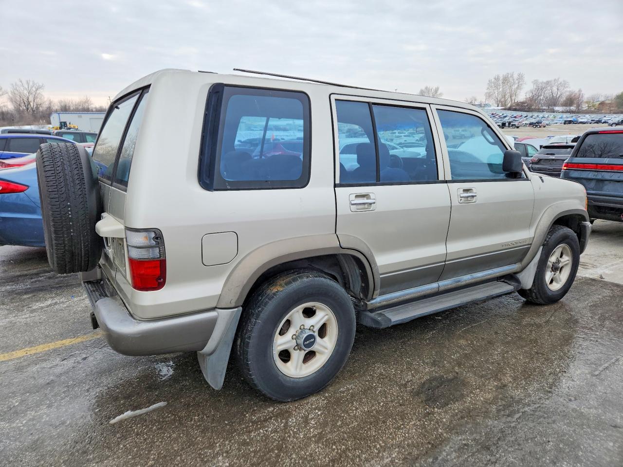 2000 Isuzu Trooper S Tan vin: JACDS58X1Y7J08798