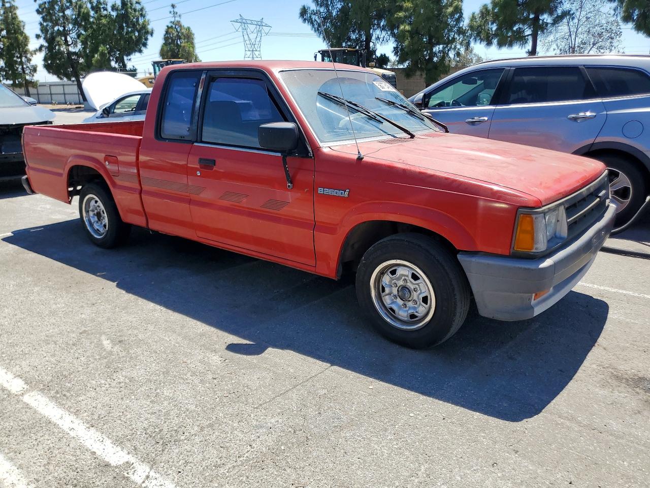 1991 Mazda B2600 Cab Plus Red vin: JM2UF3143M0116622
