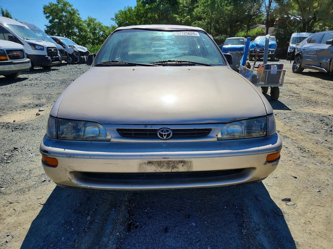 1997 Toyota Corolla Base Gold vin: 2T1BA02EXVC176906