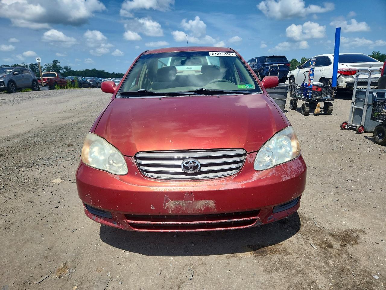 2004 Toyota Corolla Le Red vin: 2T1BR32E64C283458