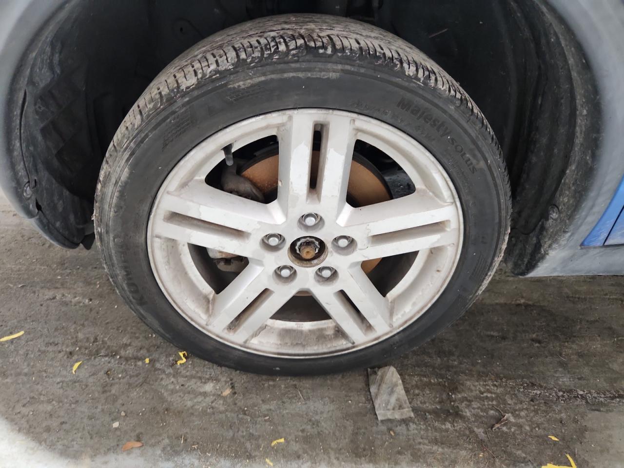 2012 Nissan Juke S Blue vin: JN8AF5MV5CT120941 Damage: Left Front Center Cap, Missing, Replacement Required