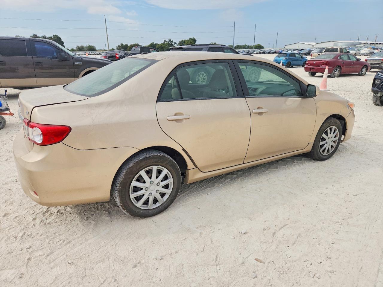 2011 Toyota Corolla Le Золотой vin: JTDBU4EE9B9148610