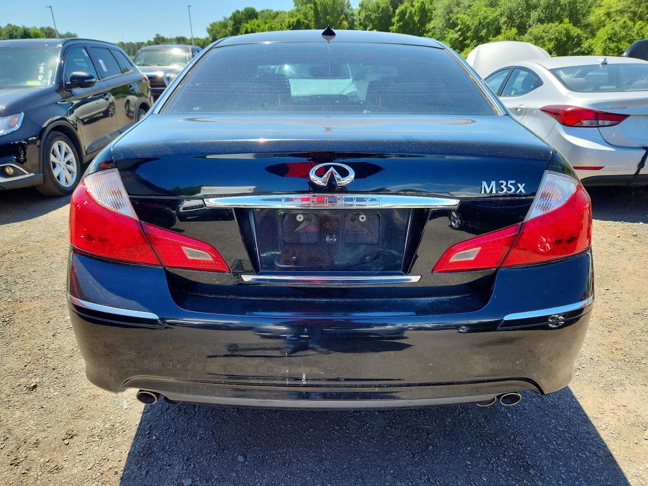 2009 Infiniti M35 X Black vin: JNKCY01F29M851276