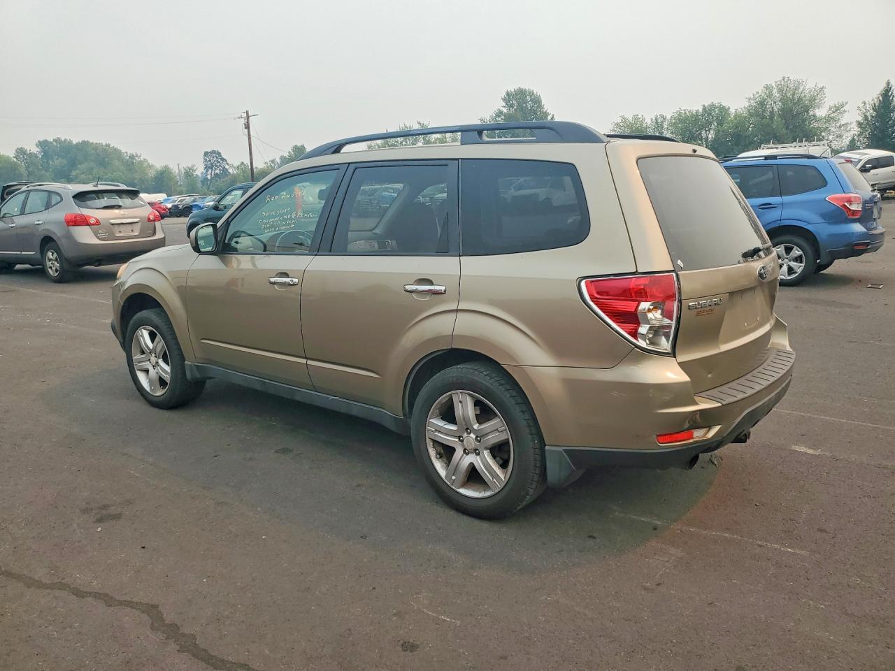 2009 Subaru Forester 2.5x Limited Золотой vin: JF2SH64619H763566