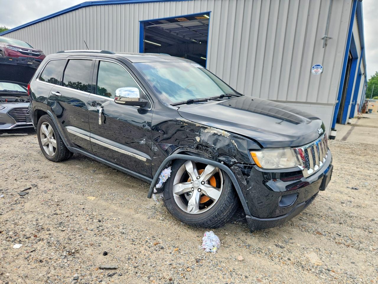 2012 Jeep Grand Cherokee Overland Black vin: 1C4RJFCG9CC279922