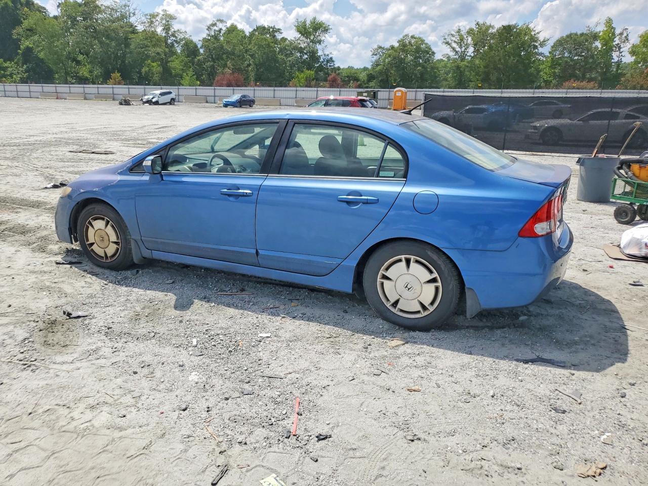 2010 Honda Civic Hybrid Blue vin: JHMFA3F27AS001555