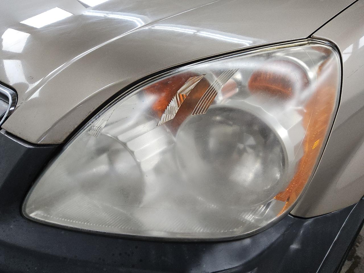 2006 Honda Cr-v Lx Gold vin: JHLRD785X6C002014 Damage: Left Head Lamp, Faded, Acceptable