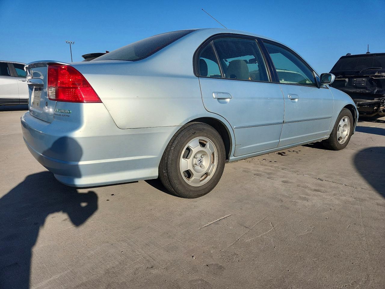 2004 Honda Civic Hybrid Blue vin: JHMES96684S017122