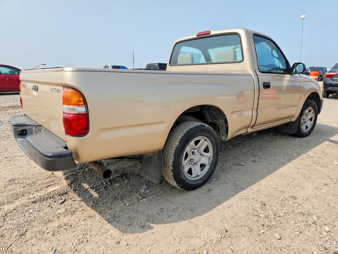 2002 Toyota Tacoma Base Gold vin: 5TENL42N62Z893906