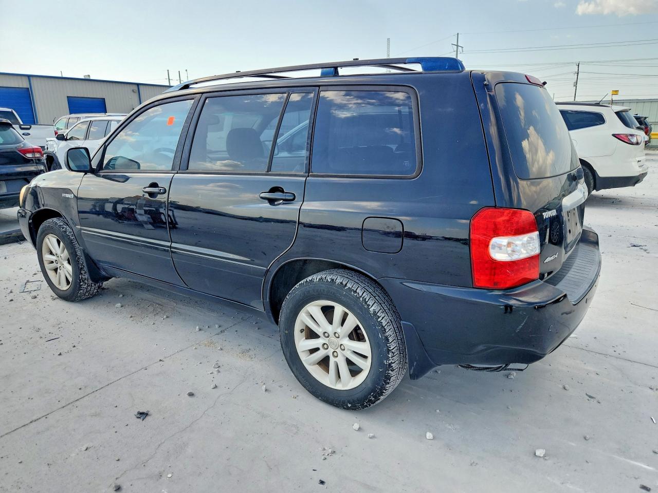 2006 Toyota Highlander Hybrid Black vin: JTEEW21A260021976