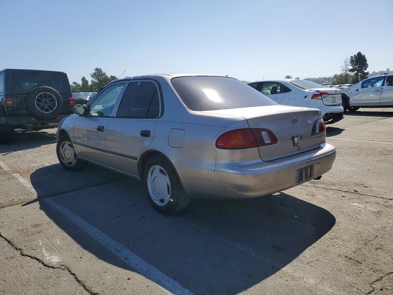 1999 Toyota Corolla Ve Cream vin: 1NXBR12E1XZ221974