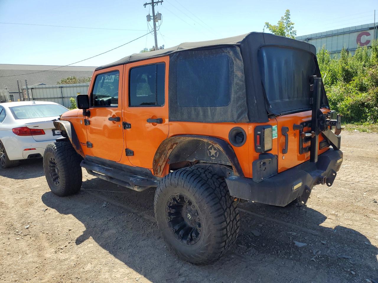 2012 Jeep Wrangler Unlimited Rubicon Orange vin: 1C4HJWFG9CL151879