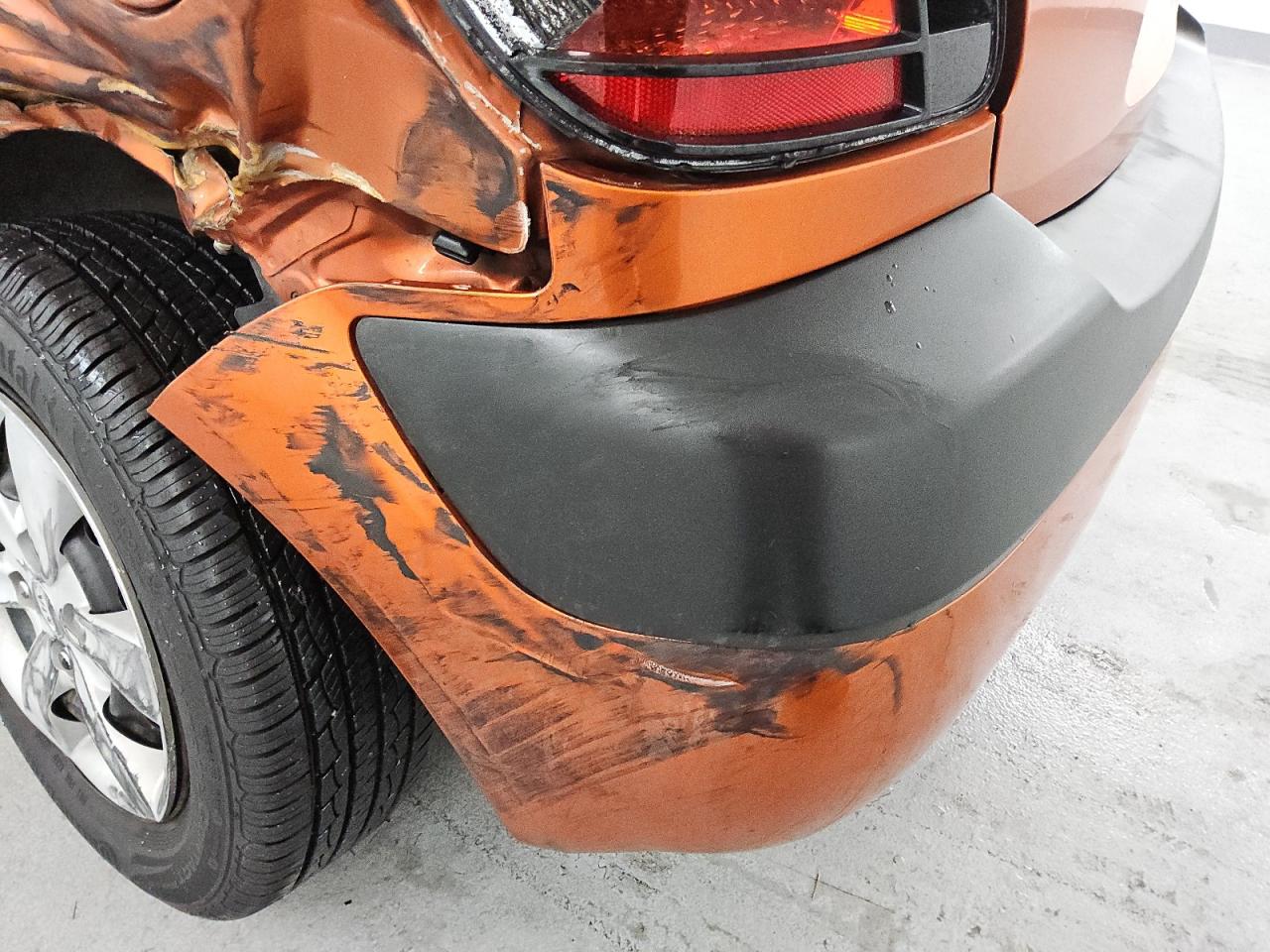2009 Kia Rio5 Lx Orange vin: KNADE243896567101 Damage: Rear Bumper, Broken, Replacement Required