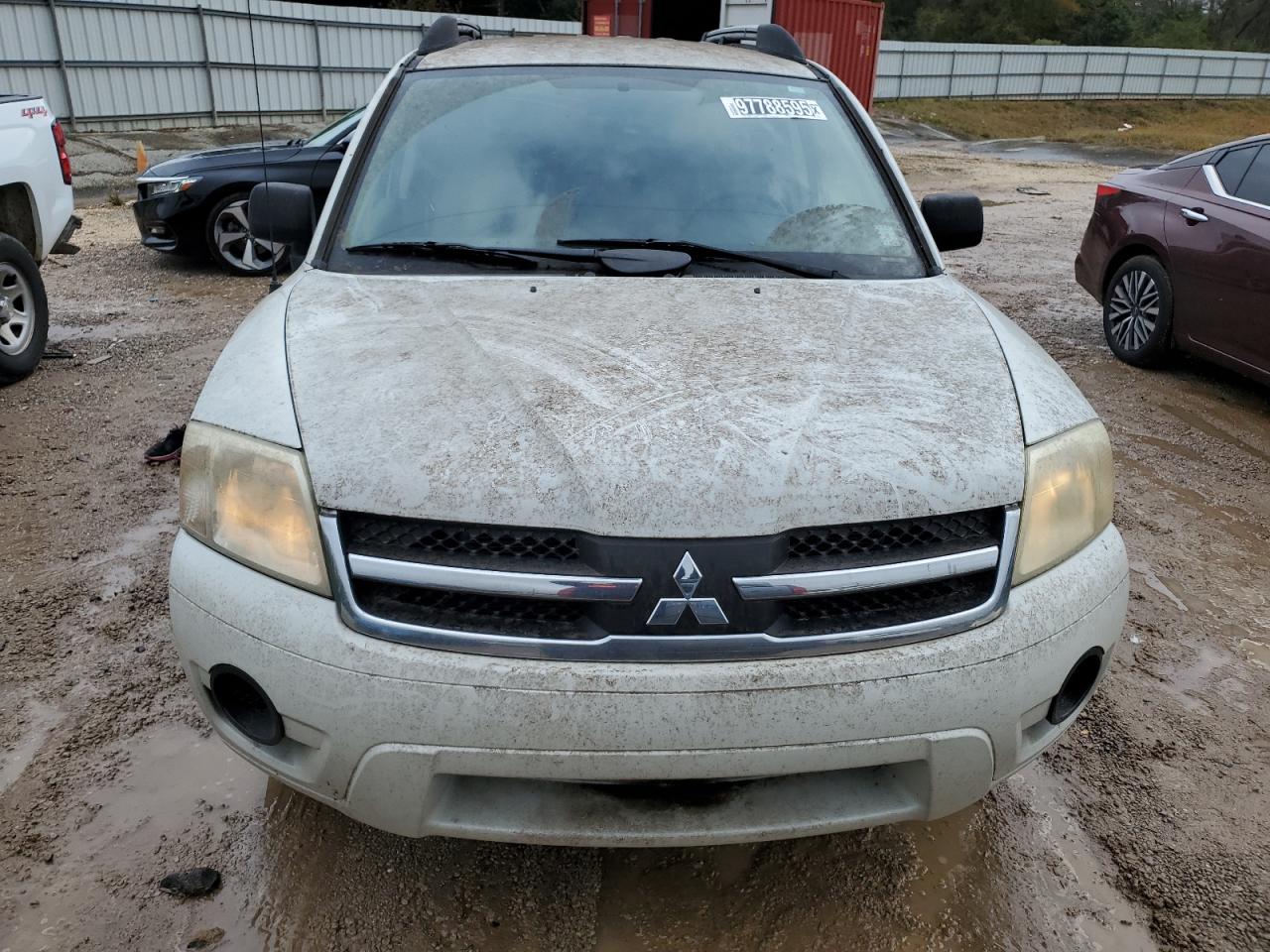 2007 Mitsubishi Endeavor Ls White vin: 4A4MM21S87E033206 Damage: Left Head Lamp, Faded, Repair Required